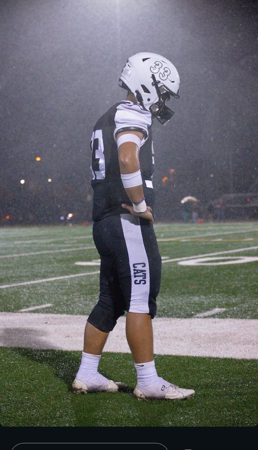 Football player in the rain