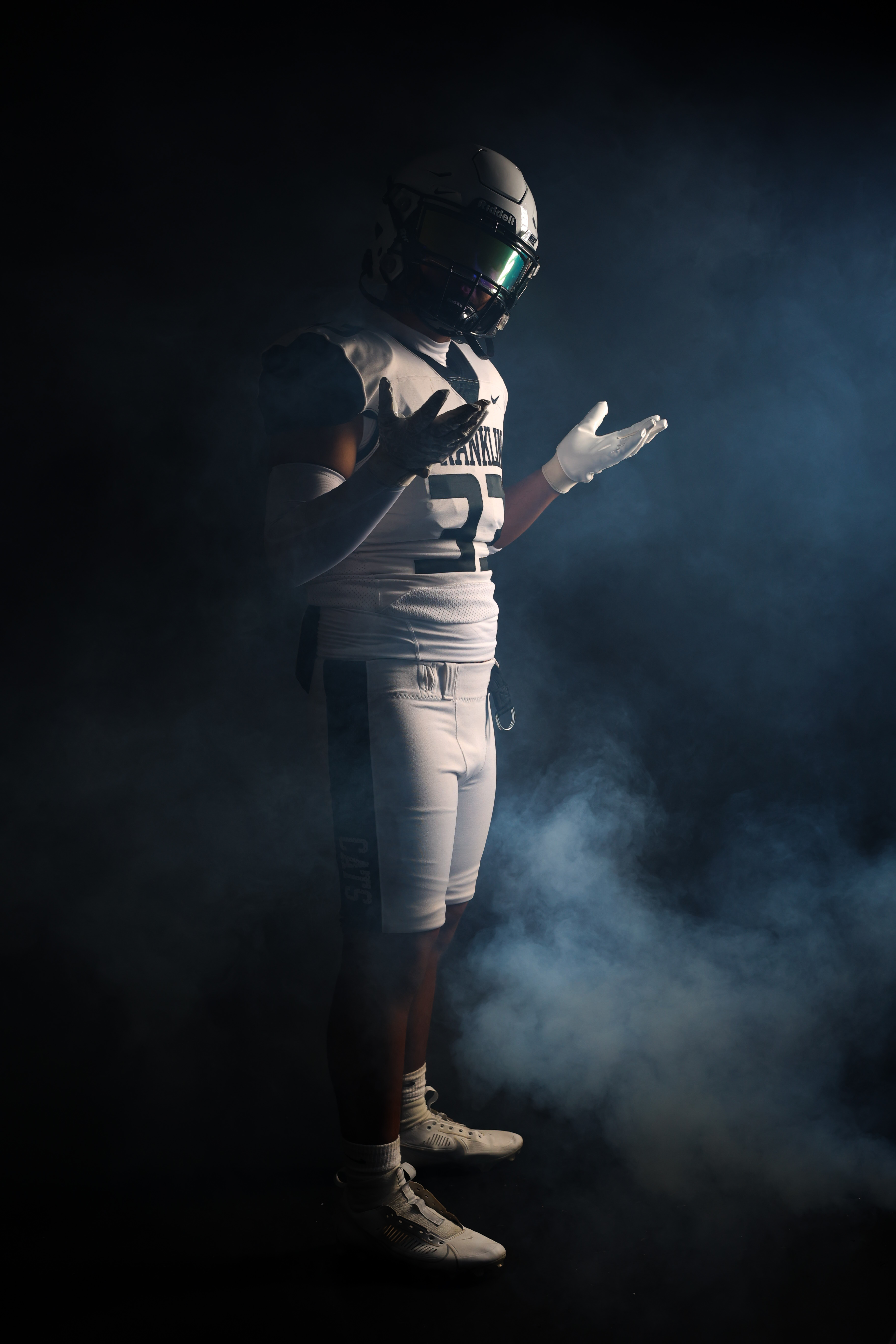Football player in smoke